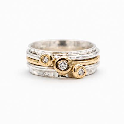 'Cariad' spinning ring handmade with solid gold, silver and diamonds