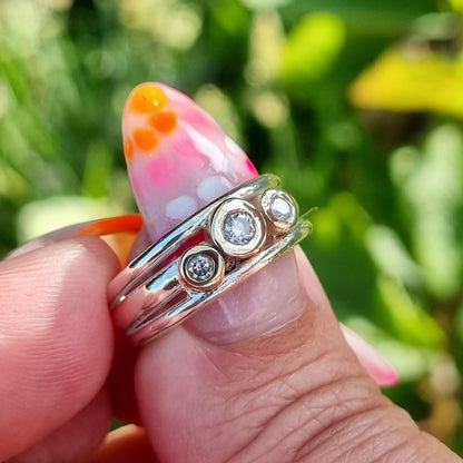 'Cariad' lite -  Gold and big diamonds on a sleek silver ring