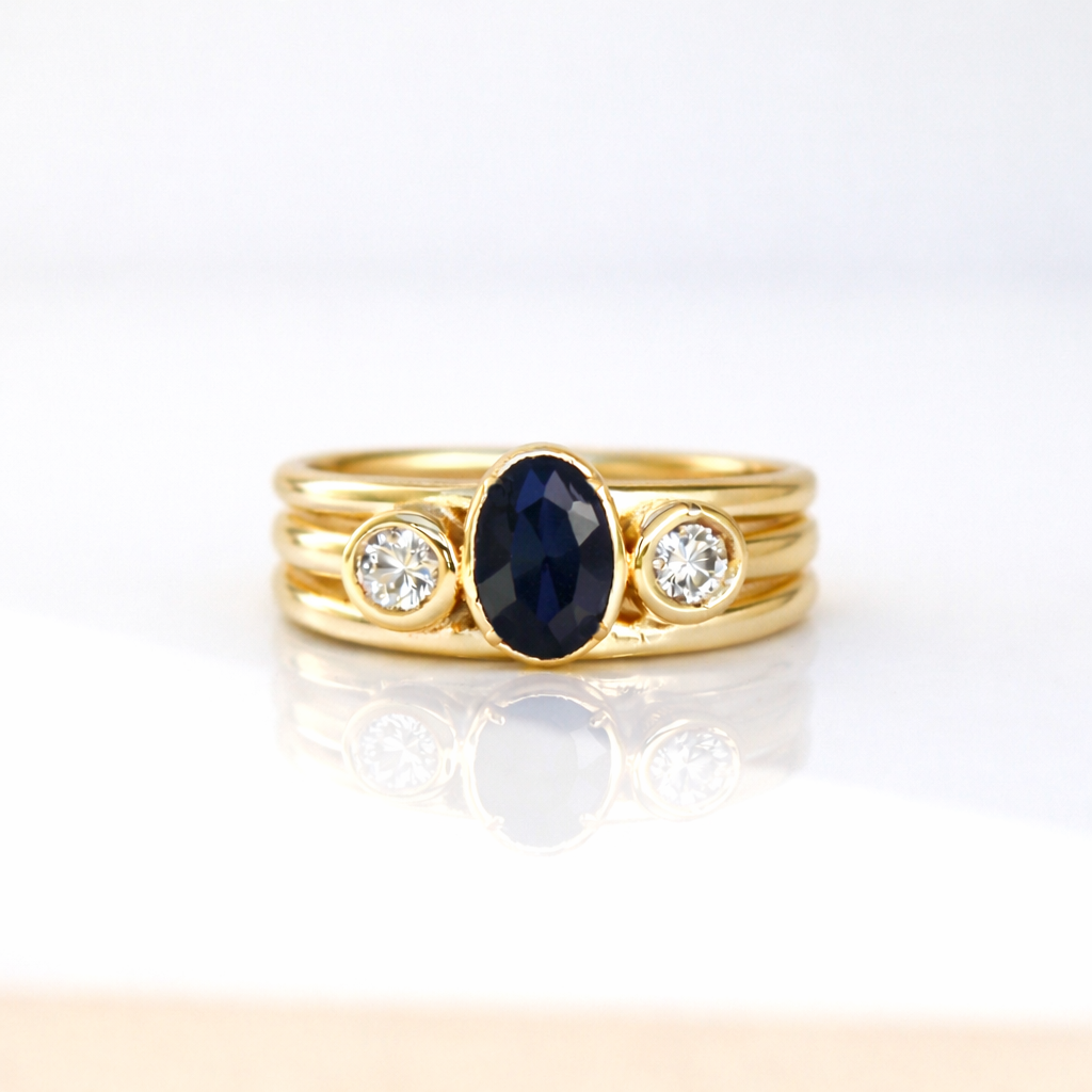 Cariad Lite in gold with large sapphire