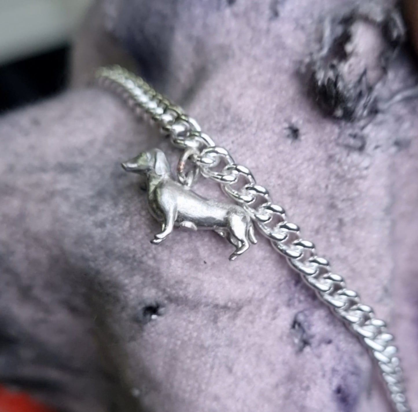Silver sausage dog on bracelet