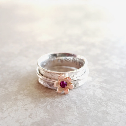 Daisy ring with rose gold detail and ruby