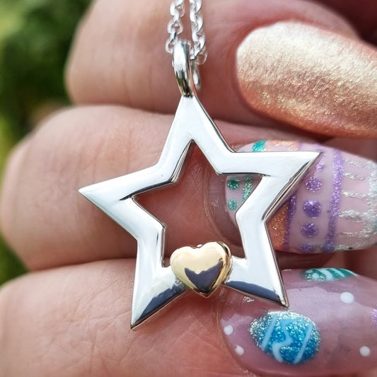 Chunky silver star with gold heart