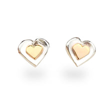 Load image into Gallery viewer, Silver and gold heart earrings.
