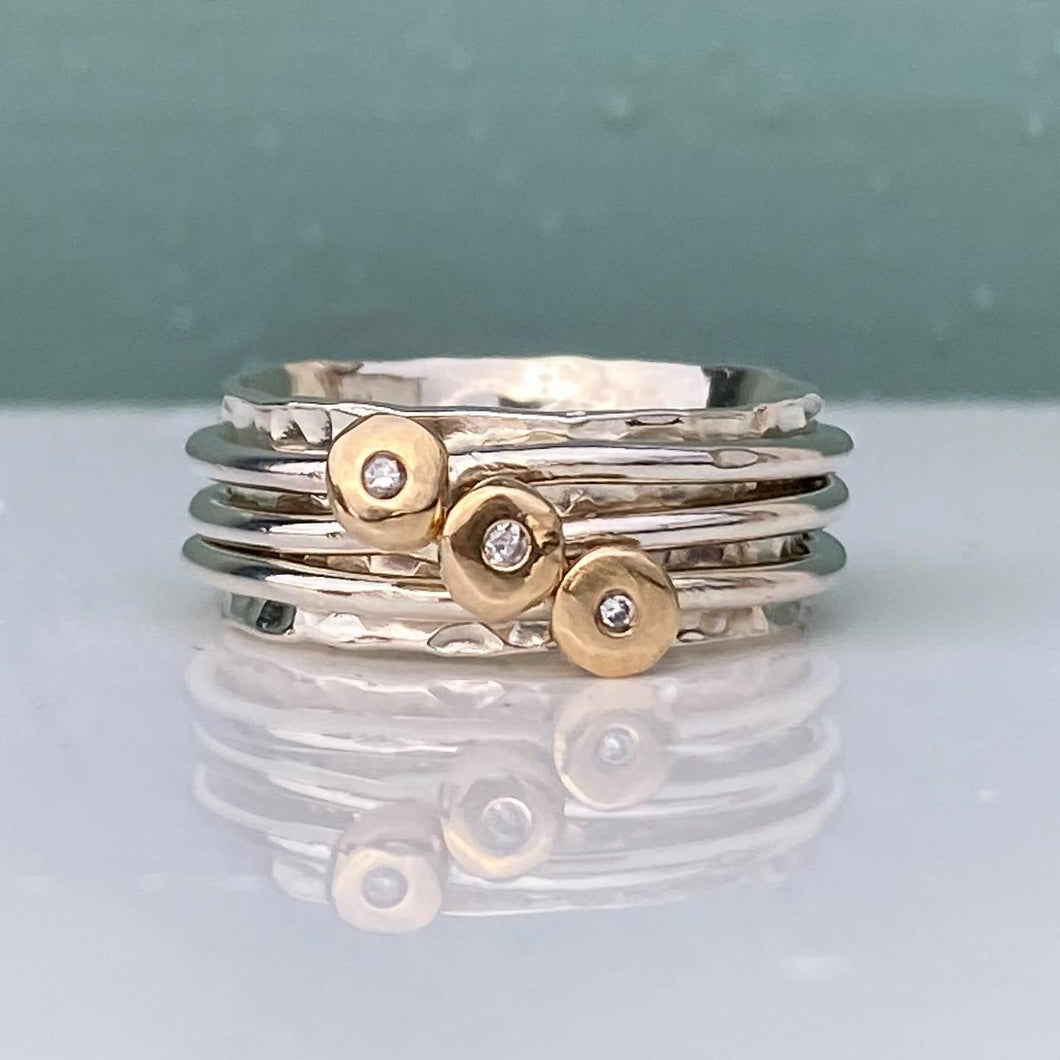 Mini 'Cariad' spinning ring handmade with solid gold, silver and diamonds