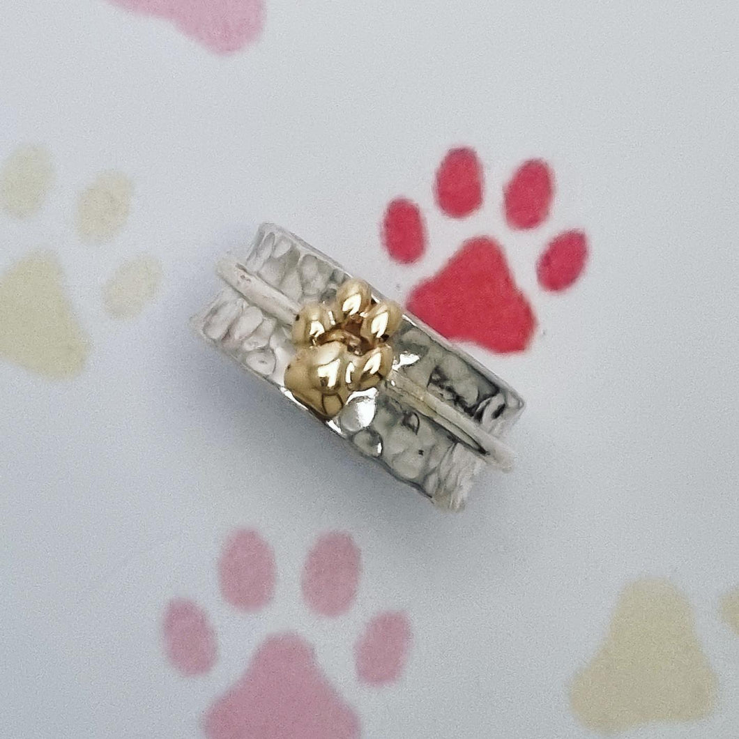 Paw spinning ring with solid gold or silver paw