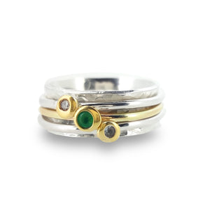 Green with envy - Spinning ring with emerald and diamonds