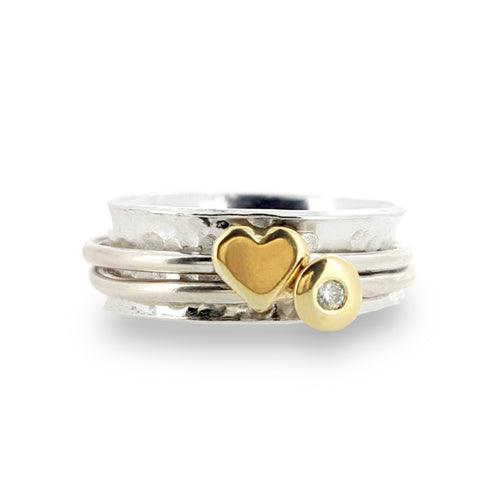 'Eternal love'. Solid silver ring set with gold heart and diamond.