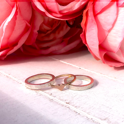 'One love' stacking set with silver rings and dainty solid gold heart