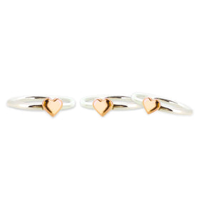 Dainty silver sweetheart stacking rings with gold hearts - set of 3