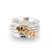 Load image into Gallery viewer, Spinning ring with diamonds set in three gold hearts