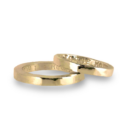 Gold wedding bands with sparkling diamonds