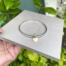 Load image into Gallery viewer, Silver sweetheart bangle with gold heart or star charm