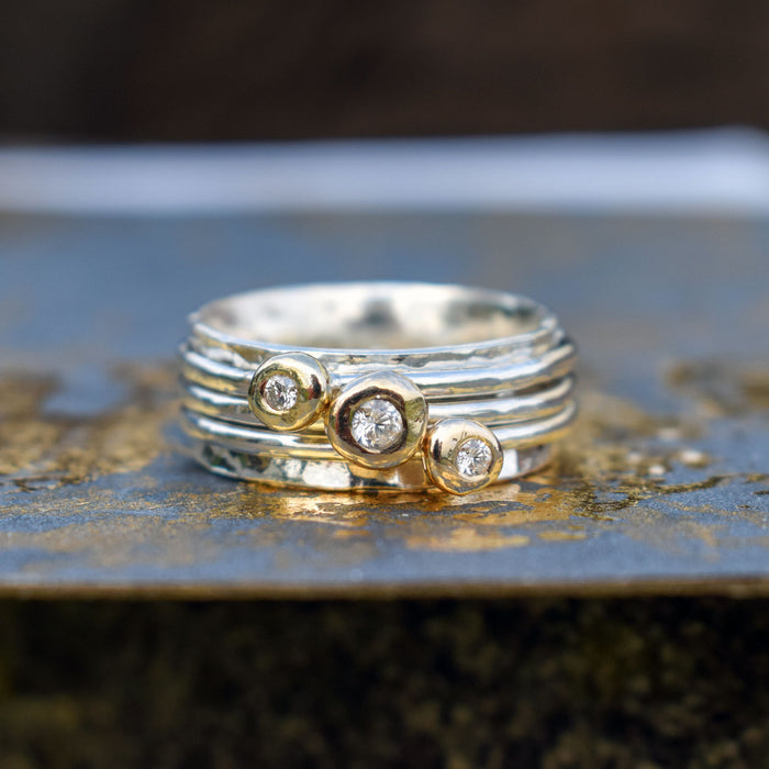 'Cariad' spinning ring handmade with solid gold, silver and diamonds