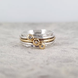 Mini 'Cariad' spinning ring handmade with solid gold, silver and diamonds