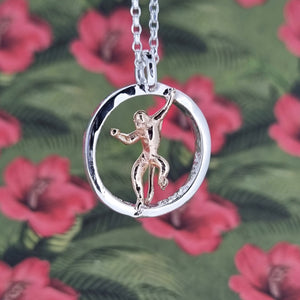 Teeny tiny gold monkey peeping out of silver halo
