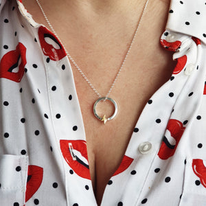 “One Power” necklace with solid gold lightning bolt