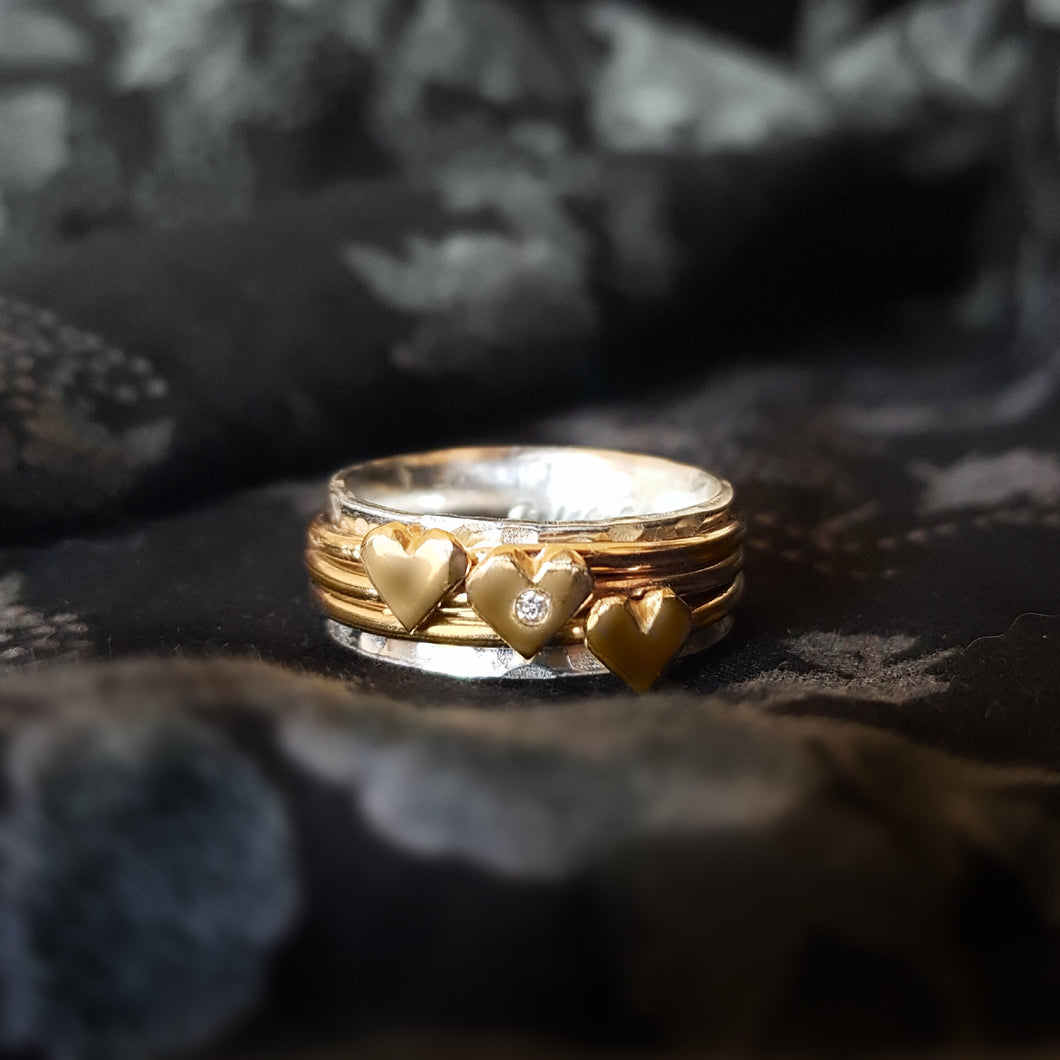 Golden delight - Handmade ring with 3 solid gold spinners, gold hearts and a sparkling diamond.