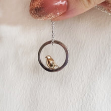 Load image into Gallery viewer, Teeny tiny gold robin peeping out of silver halo