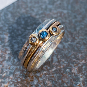 Sea of Tranquillity - Spinning ring with sapphire and diamonds
