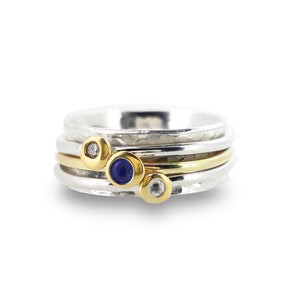 Sea of Tranquillity - Spinning ring with sapphire and diamonds