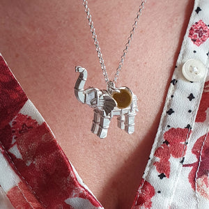 Solid silver elephant necklace with gold heart tag