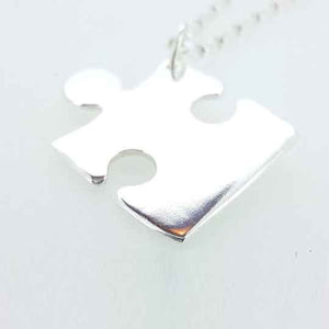 A piece of me - Personalised silver jigsaw puzzle piece necklace.