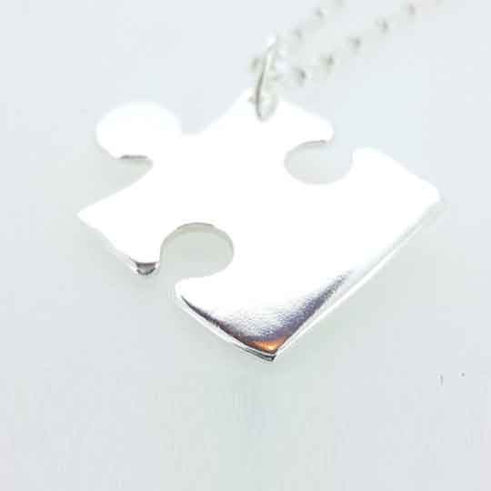 A piece of me - Personalised silver jigsaw puzzle piece necklace.